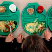 File photo dated 08/03/07 of children eating a school meal. Most children in Reception year in Wales will begin to receive free school meals from September, the Welsh Government has announced. Issue date: Monday June 20, 2022.