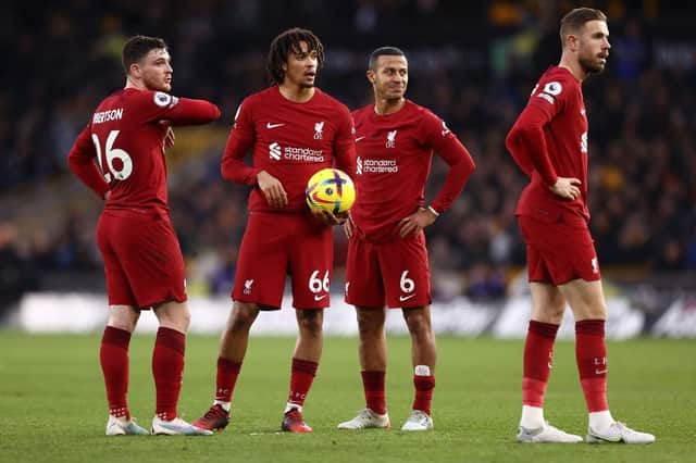 Trent Alexander-Arnold of Liverpool looks on with his team mates during the Premier League match between Wolverhampton Wanderers and Liverpool FC at Molineux on February 04, 2023 in Wolverhampton, England. (Photo by Naomi Baker/Getty Images)