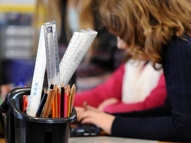 A stock photo of primary school children at work in a classroom. Photo: PA