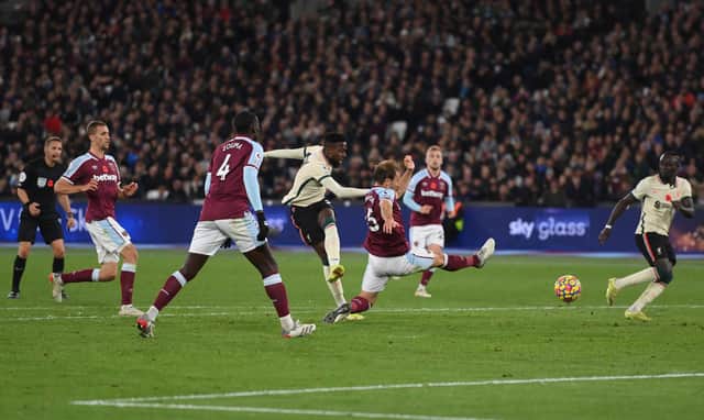 LONDON, ENGLAND - NOVEMBER 07: Divock Origi of Liverpool scores their side's second goal during the Premier League match between West Ham United and Liverpool at London Stadium on November 07, 2021 in London, England. (Photo by Mike Hewitt/Getty Images)