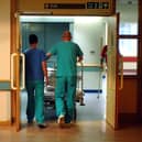 A quarter of people in Liverpool hospitals are taking up beds and do not need to be there, a health committee has been told.