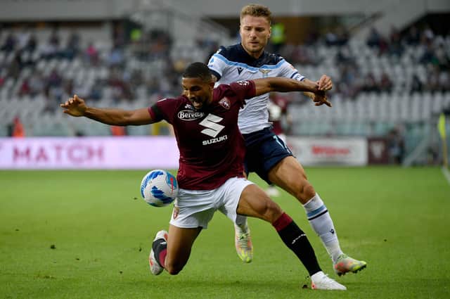 TURIN, ITALY - SEPTEMBER 23: Ciro Immobile of SS Lazio competes for the ball with Gleison Bremer of Torino FC during the Serie A match between Torino FC v SS Lazio at Stadio Olimpico di Torino on September 23, 2021 in Turin, Italy. (Photo by Marco Rosi - SS Lazio/Getty Images)