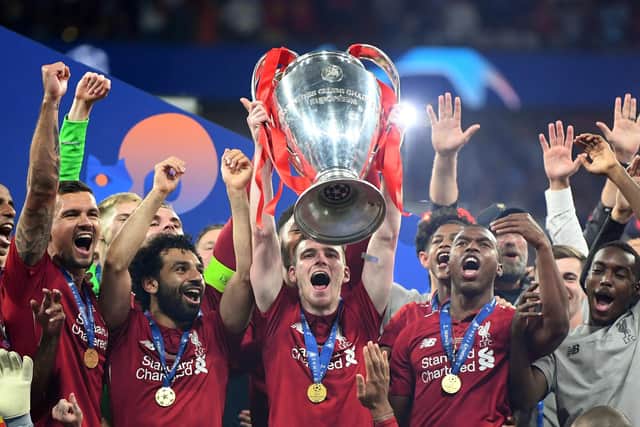 Scotland captain Andy Robertson, pictured with the Champions League trophy after Liverpool's 2019 triumph, hopes to win the tournament again this weekend before reporting for World Cup play-off duty with his country next week. (Photo by Michael Regan/Getty Images)
