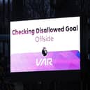 BIRMINGHAM, ENGLAND - DECEMBER 30: A general view of the scoreboard as the VAR review a goal scored by Lyle Foster of Burnley (not pictured) which is disallowed for offside during the Premier League match between Aston Villa and Burnley FC at Villa Park on December 30, 2023 in Birmingham, England. (Photo by Richard Heathcote/Getty Images)