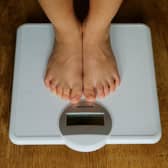 File photo dated 15/7/2014 of a person on scales. The number of counselling sessions for young children about eating and body image disorders in the past year has risen, a charity said. Issue date: Friday August 13, 2021.