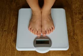 File photo dated 15/7/2014 of a person on scales. The number of counselling sessions for young children about eating and body image disorders in the past year has risen, a charity said. Issue date: Friday August 13, 2021.