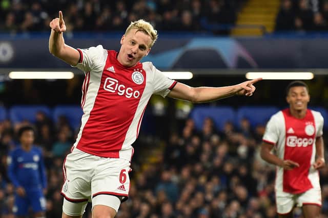 Ajax's Dutch midfielder Donny Van de Beek celebrates after scoring their fourth goal during the UEFA Champion's League Group H football match between Chelsea and Ajax at Stamford Bridge in London on November 5, 2019. (Photo by Glyn KIRK / AFP) (Photo by GLYN KIRK/AFP via Getty Images)