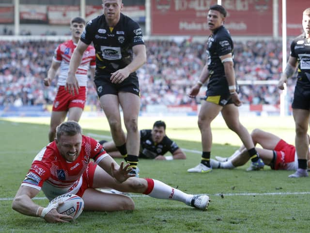 St Helens' Joe Batchelor scores his side's second try of the game. Picture: Will Matthews/PA Wire.