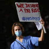 Nurses will strike from tomorrow. (Photo by JUSTIN TALLIS/AFP via Getty Images)