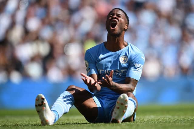 Manchester City's English midfielder Raheem Sterling reacts to a missed chance during the English Premier League football match between Manchester City and Arsenal at the Etihad Stadium in Manchester, north west England, on August 28, 2021. - (Photo by OLI SCARFF/AFP via Getty Images)