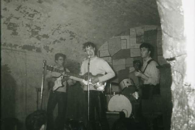 Handout photo issued by Tracks Ltd of The Beatles playing at Liverpool's Cavern Club in July 1961.