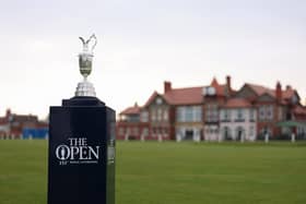 The Claret Jug in front of the clubhouse at Royal Liverpool Golf Club, which will host The 151st Open this July. Photo by Richard Heathcote/Getty Images. 