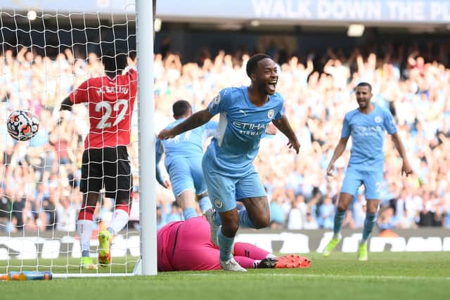 MANCHESTER, ENGLAND - SEPTEMBER 18: Raheem Sterling of Manchester City celebrates after scoring a goal which is later disallowed due to offside during the Premier League match between Manchester City and Southampton at Etihad Stadium on September 18, 2021 in Manchester, England. (Photo by Laurence Griffiths/Getty Images)