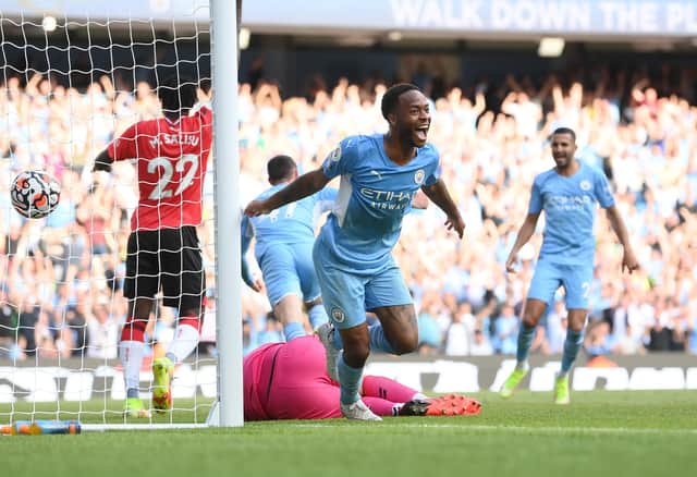 MANCHESTER, ENGLAND - SEPTEMBER 18: Raheem Sterling of Manchester City celebrates after scoring a goal which is later disallowed due to offside during the Premier League match between Manchester City and Southampton at Etihad Stadium on September 18, 2021 in Manchester, England. (Photo by Laurence Griffiths/Getty Images)