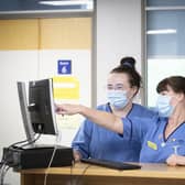 Nurses face staff shortages and low pay. 
