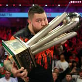 More than 1.5 million people saw Michael Smith lift the prestigious prize at the Alexandra Palace after he defeated Michael van Gerwen 7-4 in the final. (Photo by Luke Walker/Getty Images)