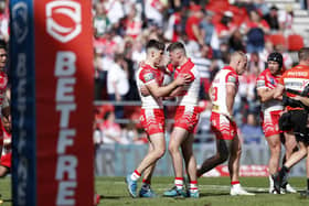 St Helens' Jonathan Bennison (left) is congratulated by his team mates after scoring his side's third try of the game. Picture: Will Matthews/PA Wire.